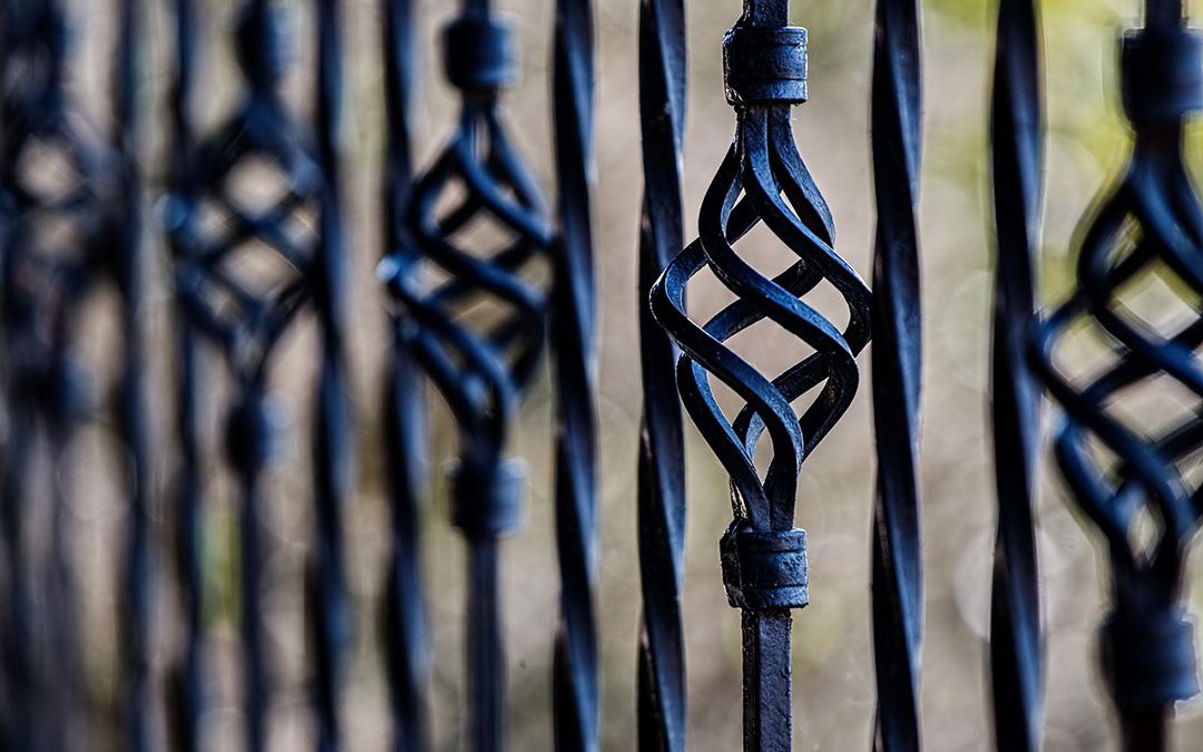 How Can You Remove Rust from an Old Wrought Iron Fence?